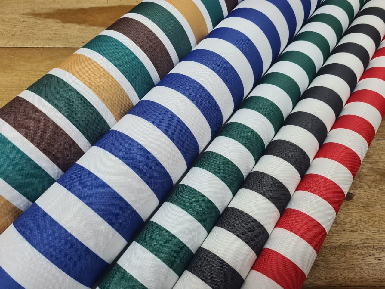 Tela Lona impermeable Engomada Listada y Estampada